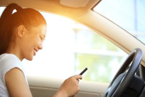 New Yorkers May Not Use Portable Electronic Devices While Driving